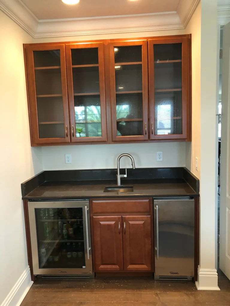 Matched wood bar cabinets in house