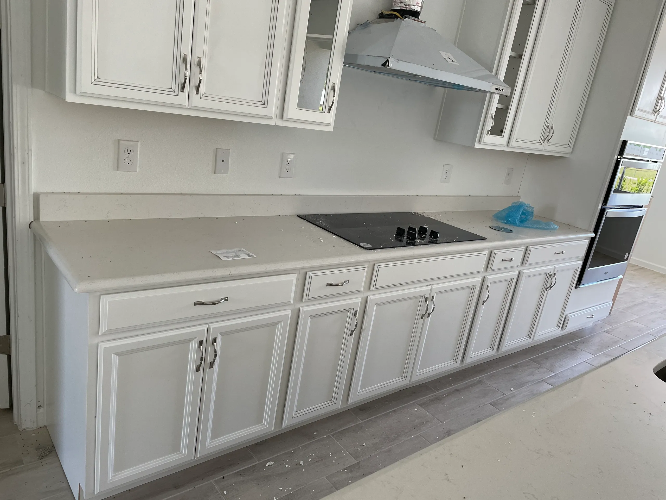 Upper and lower kitchen cabinets installed